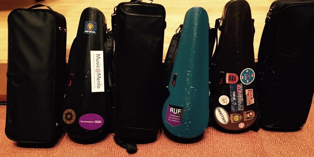 Viola cases during orchestra rehearsal.
