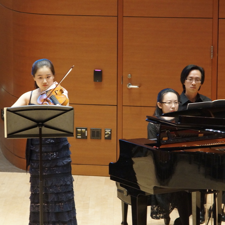 Yuan performing in recital.