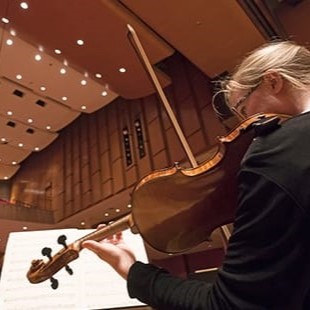 Susan preparing for an orchestra concert.